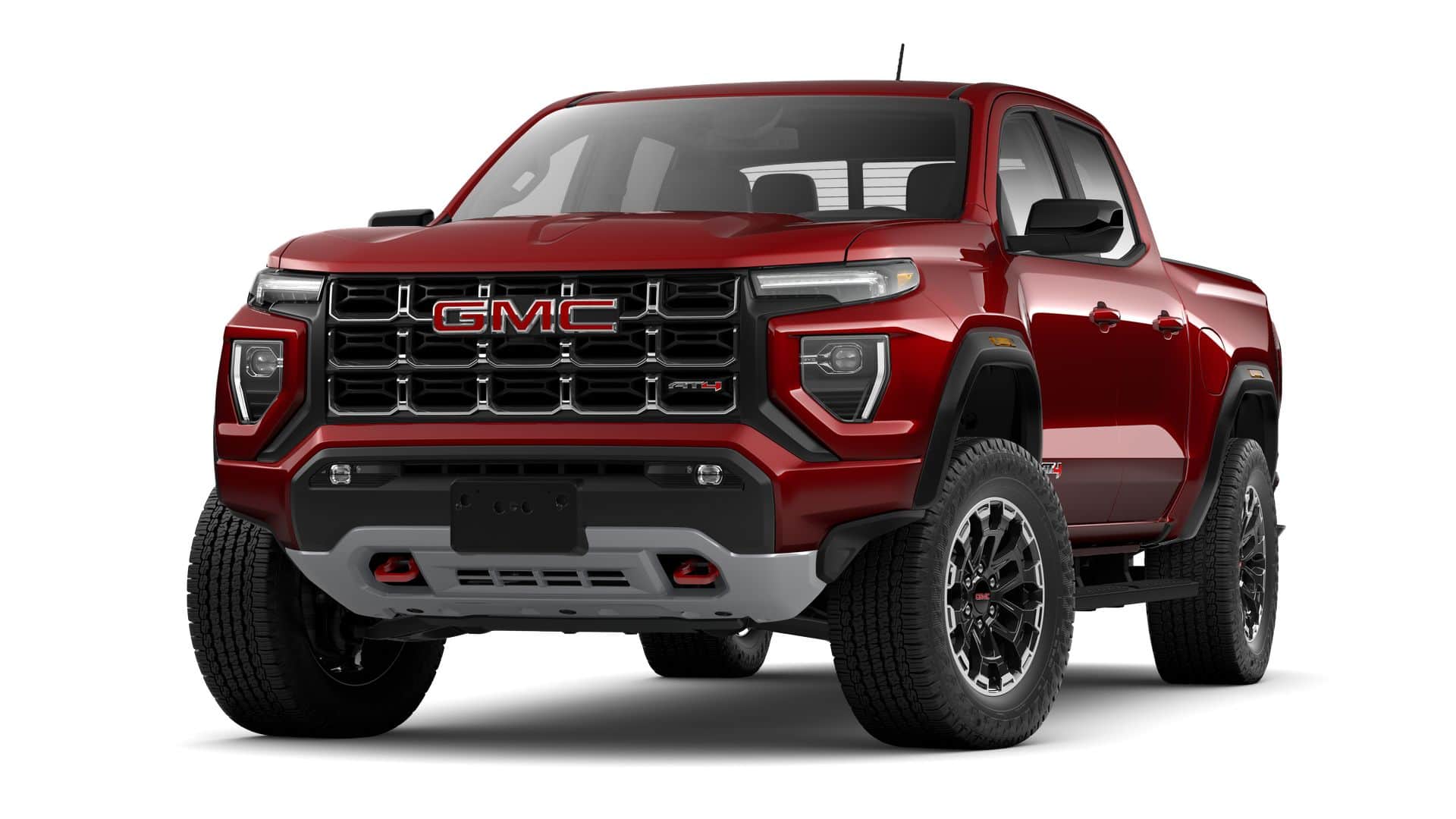 2026 GMC Canyon AT4 in Volcanic Red Tintcoat — front three-quarter view