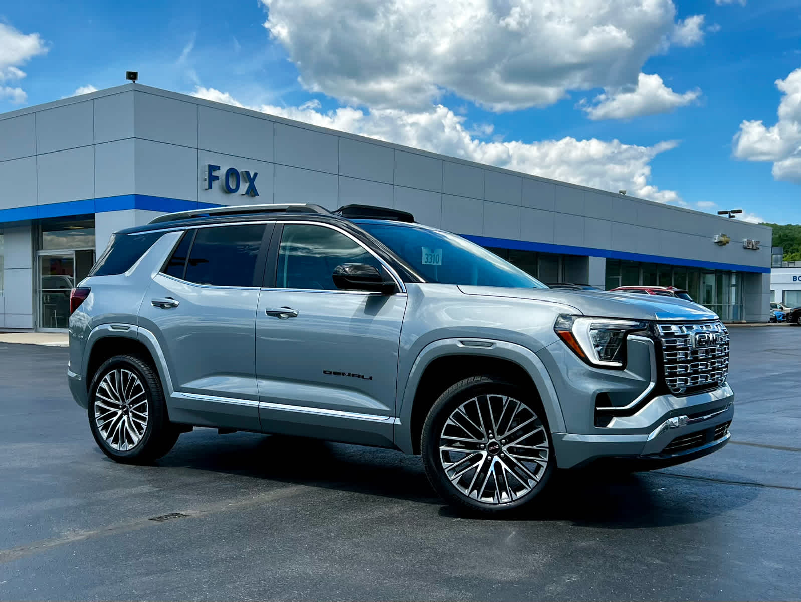 2026 GMC Terrain Denali in Sterling Metallic — front three-quarter view