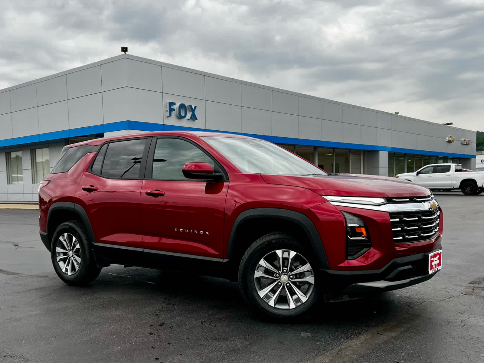 2026 Chevrolet Equinox LT in Radiant Red Tintcoat — front three-quarter view